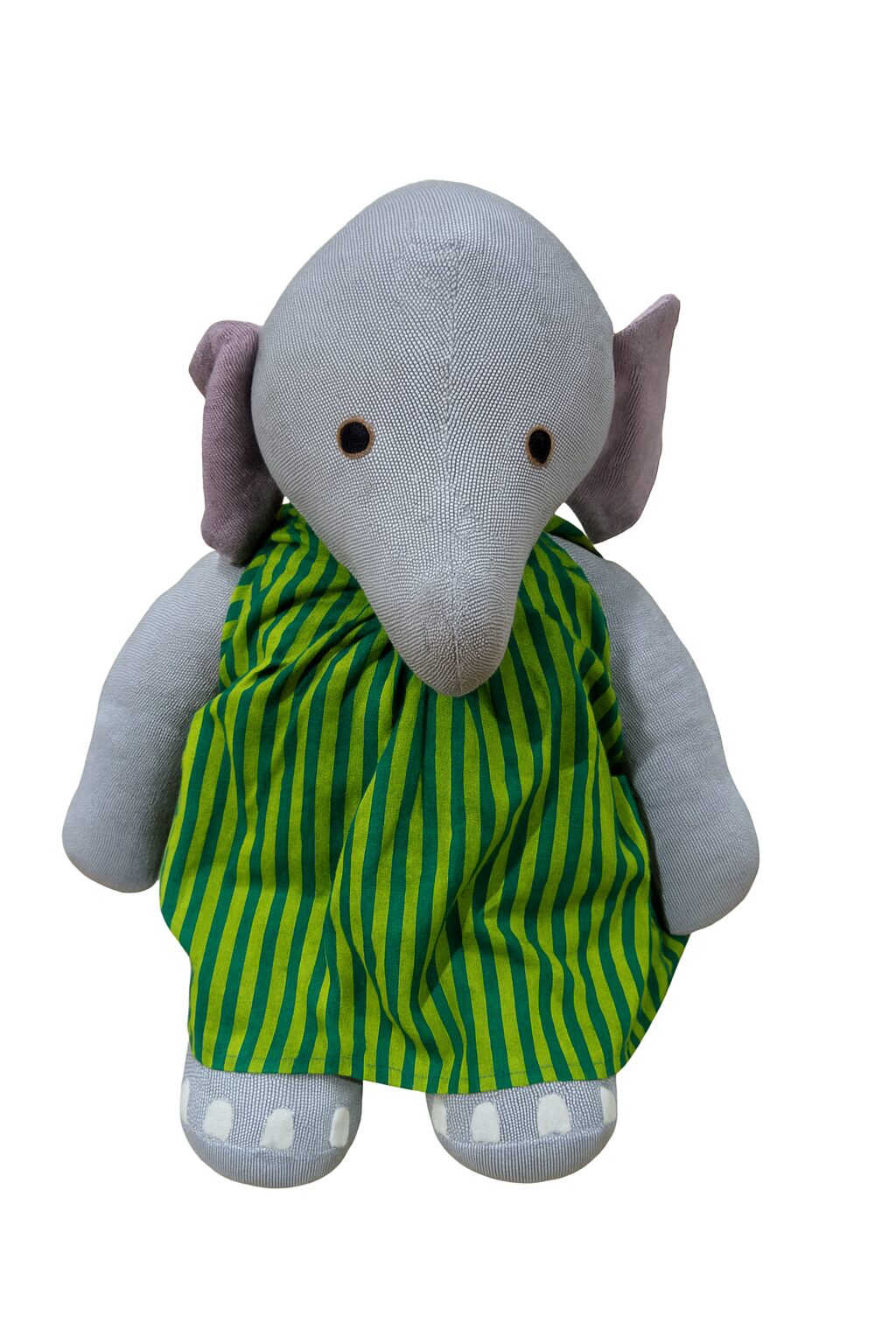 Barefoot large elephant in green dress